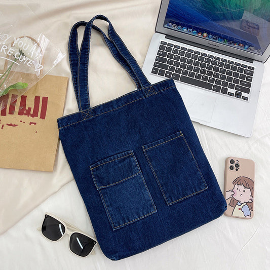 large nylon shoulder bag zipper pockets,” “student commuter tote bag.”